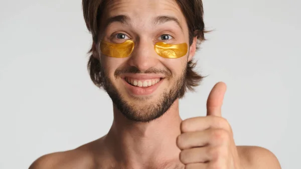 Handsome Bearded Man Gold Patches Eyes Smiling Showing Thumb Camera — Stock Photo, Image