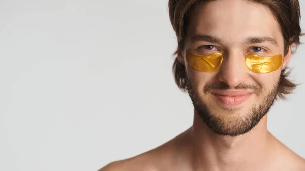 Handsome Bearded Man Gold Patches Eyes Smiling Camera White Background — Stock Photo, Image