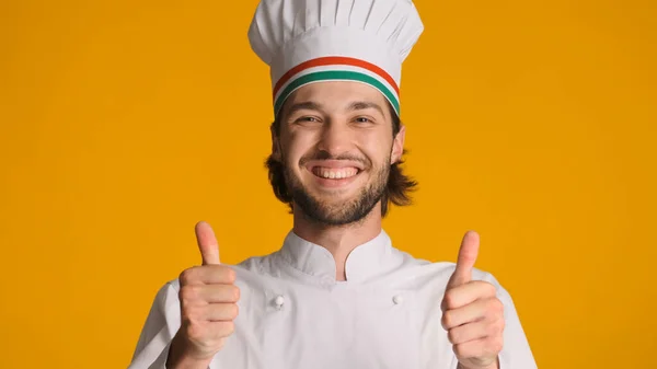 Portrait Happy Male Chef Uniform Keeping Thumbs Camera Colorful Background — Stock Photo, Image