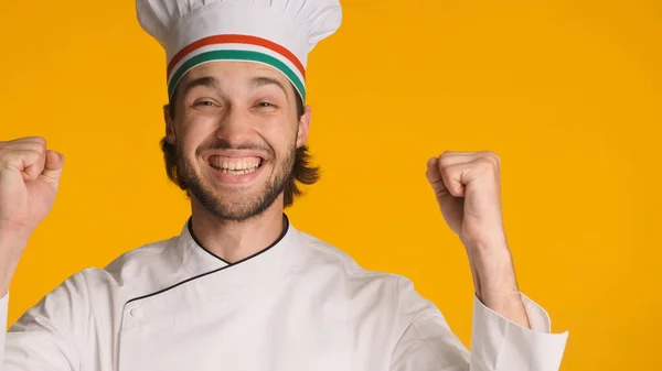 Close Successful Male Chef Wearing Uniform Rejoicing Camera Yellow Background — Stock Photo, Image