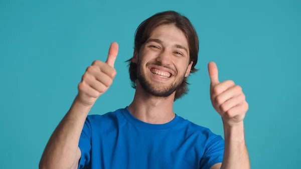 Cheerful Bearded Man Keeping Thumbs Showing Gesture Smiling Camera Blue — Stock Photo, Image