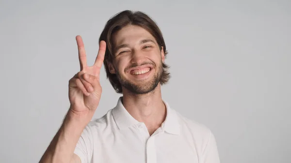 Cheerful Bearded Guy Showing Peace Sign Sincerely Smiling Camera Gray — Stock Photo, Image