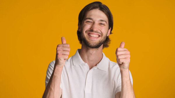 Cheerful Brunette Man Keeping Thumb Colorful Background Handsome Guy Sincerely Stock Image
