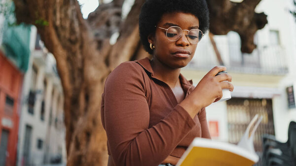 Beautiful Afro Woman Reading Book Street Wearing Glasses Dark Skinned Royalty Free Stock Photos