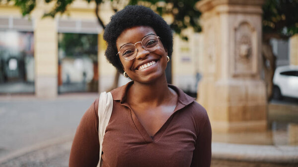 Cheerful African Woman Glasses Looking Happy Smiling Camera Outdoors Carefree Stock Photo