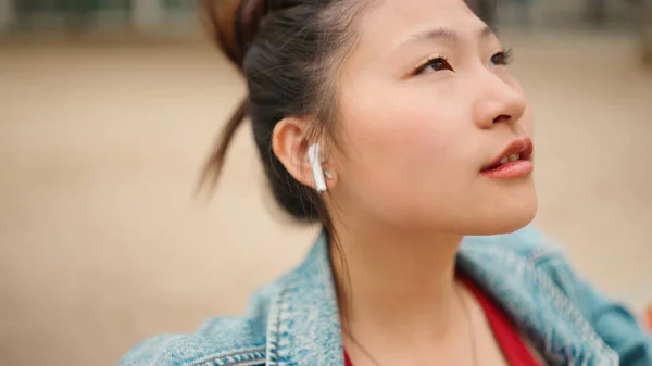 Close Beautiful Asian Woman Looking Pensive Listening Her Favorite Song Royalty Free Stock Photos