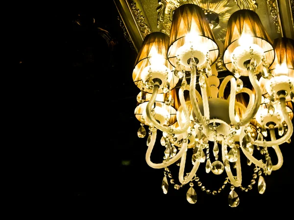 Mystical interior with chandelier lights and reflections — Stock Photo, Image