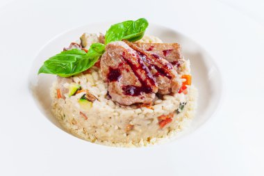 Risotto with meat of a duck clipart