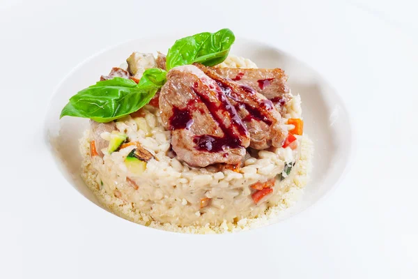Risotto with meat of a duck — Stock Photo, Image