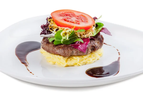 Beef steak with mashed potato and tomatoes — Stock Photo, Image