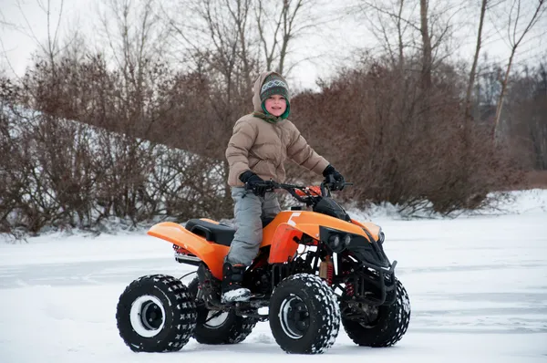 Jongen atv riding — Stockfoto