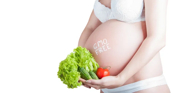 Gravid mage med "gmo-fria" skylt isolerade — Stockfoto