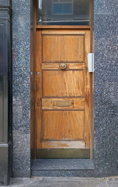 Wooden entrance door — Stock Photo, Image