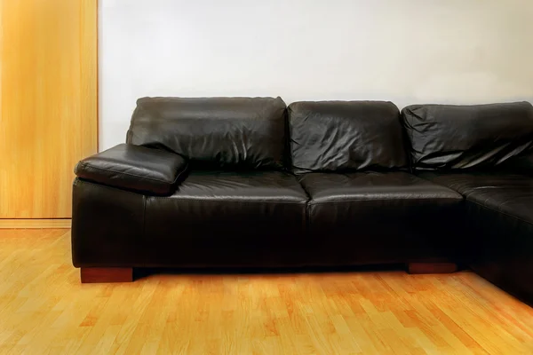 Läder soffa svart — Stockfoto