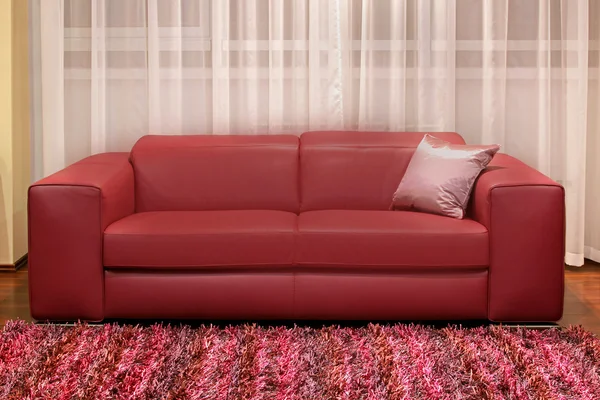 Burgundy couch — Stock Photo, Image