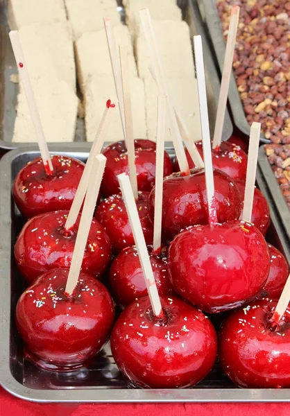 Apples on stick — Stock Photo, Image