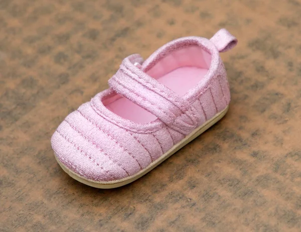 Small Shoe Baby Girl Pink Colour Carpet Indoors — Stock Photo, Image