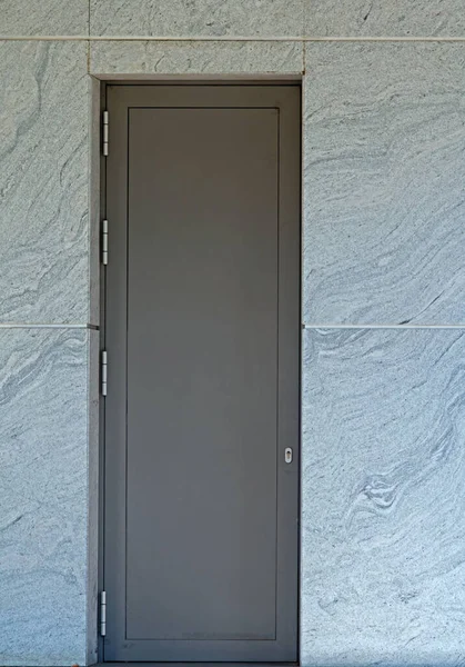 Closed Metal Door Stone Facade Wall — Stock Photo, Image