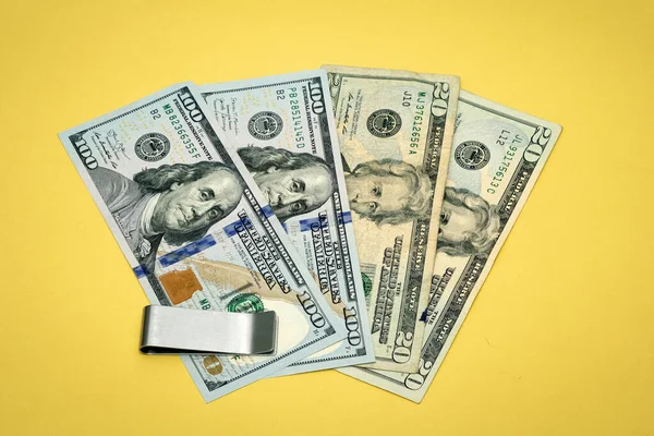 Dollar Paper Banknotes Money Silver Clip Yellow Background — Zdjęcie stockowe