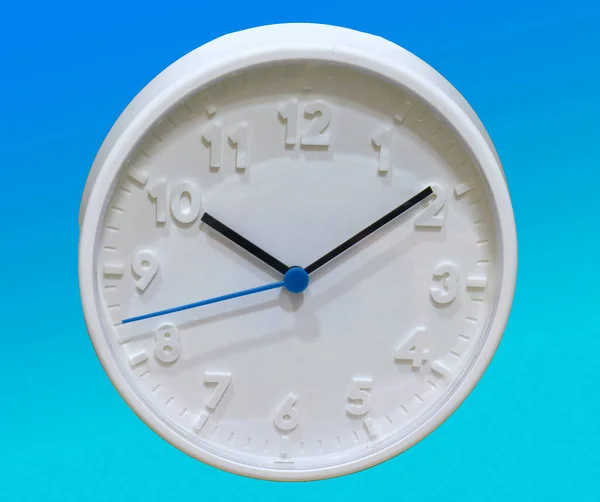 Retro White Circle Wall Clock Isolated Blue Background — 스톡 사진