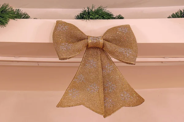 Decorative Gold Sparkling Bow Interior Wall — Stock Photo, Image