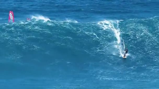 Professional windsurfer rides a giant wave — Stock Video