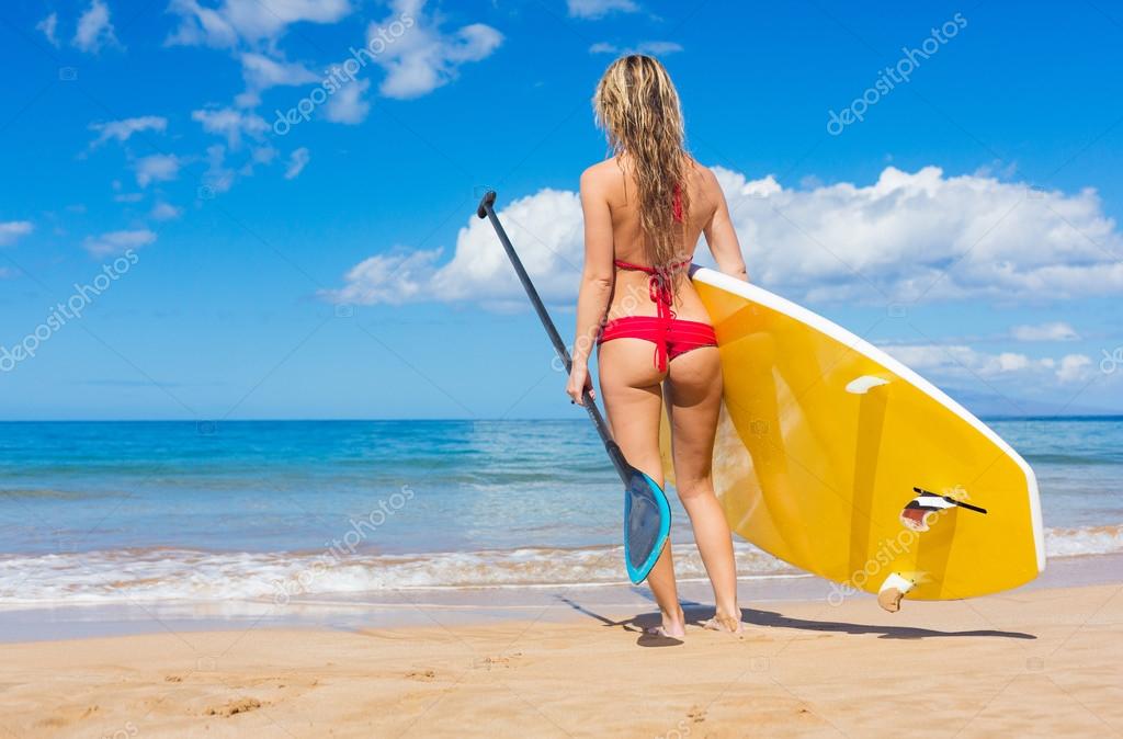 Woman with Stand Up Paddle Board — Stock Photo © EpicStockMedia 30911469