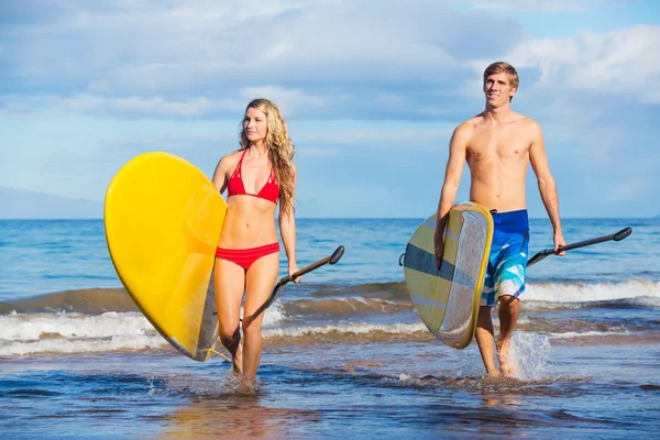 Pareja de Stand Up remando en Hawaii —  Fotos de Stock