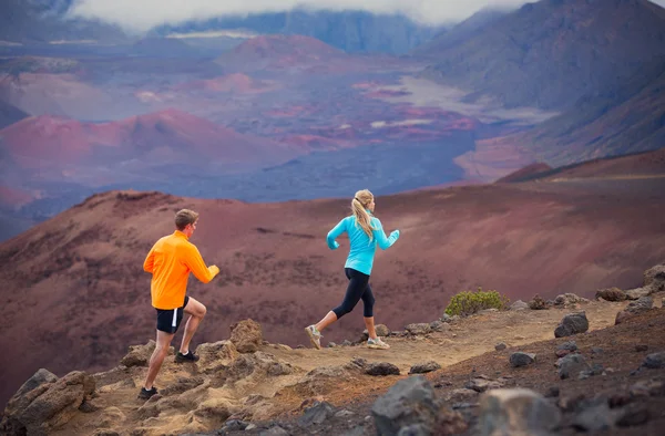 Fitness sport couple running jogging outside on trail — Stock Photo, Image