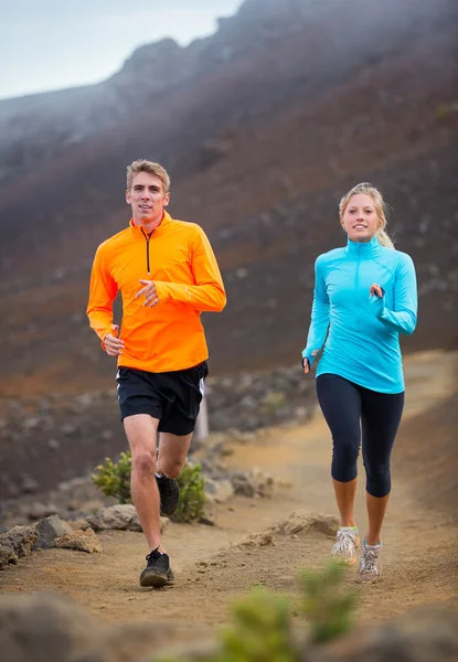 Fitness sport couple running jogging outside on trail — Stock Photo, Image