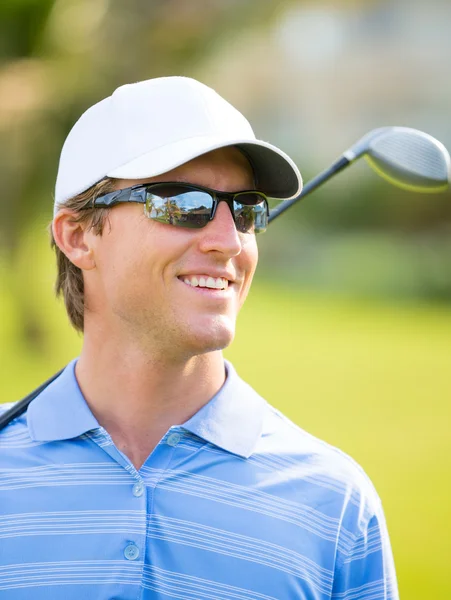 Athletic young man playing golf — Stock Photo, Image