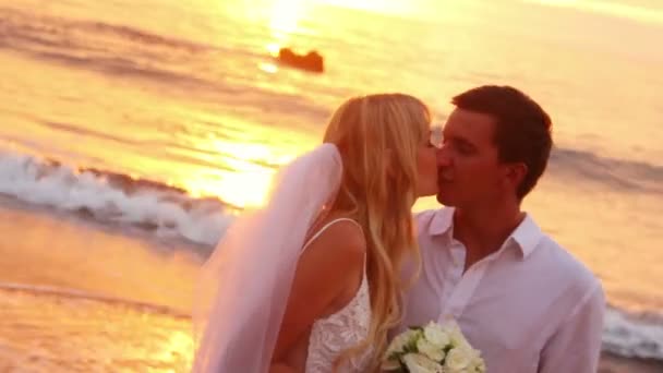 Bride and Groom on Beautiful Tropical Beach at Sunset — Stock Video