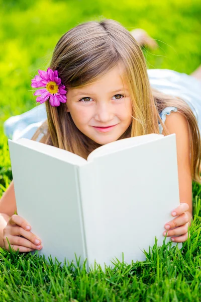 Adorable little girl reading book — Stock Photo, Image