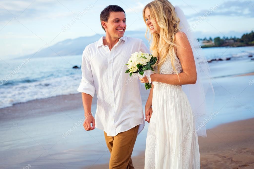 Bride and groom at tropical beach