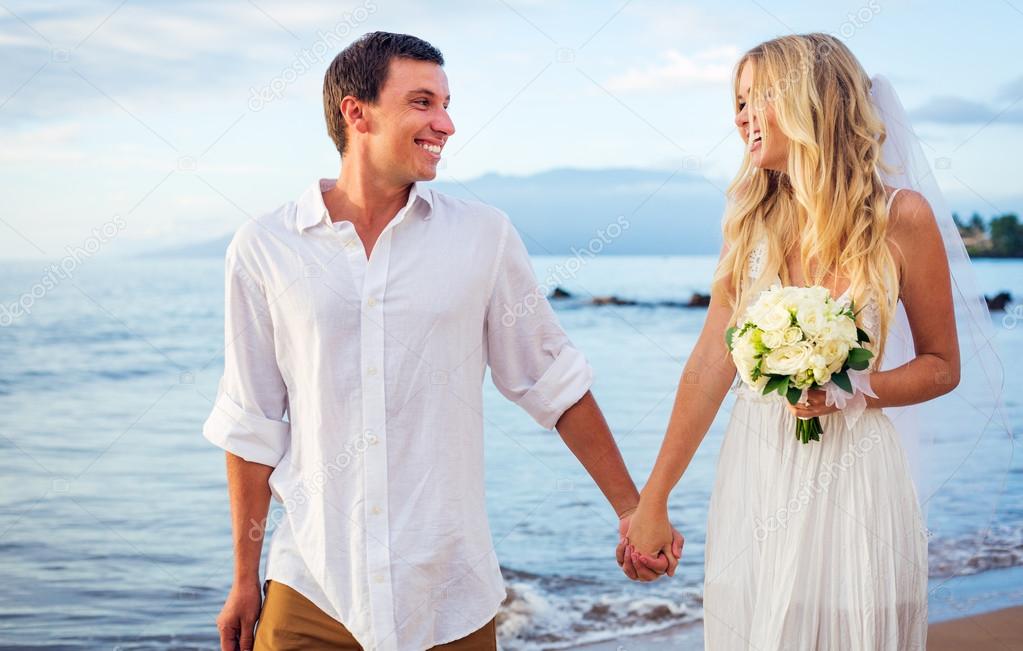 Bride and groom at tropical beach