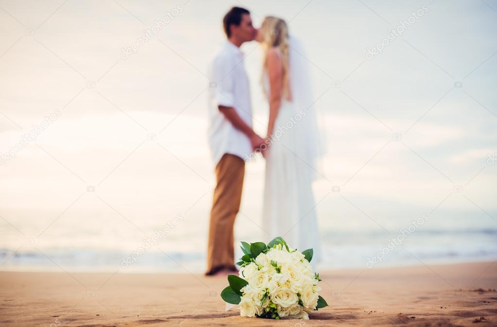 Bride and groom at beach