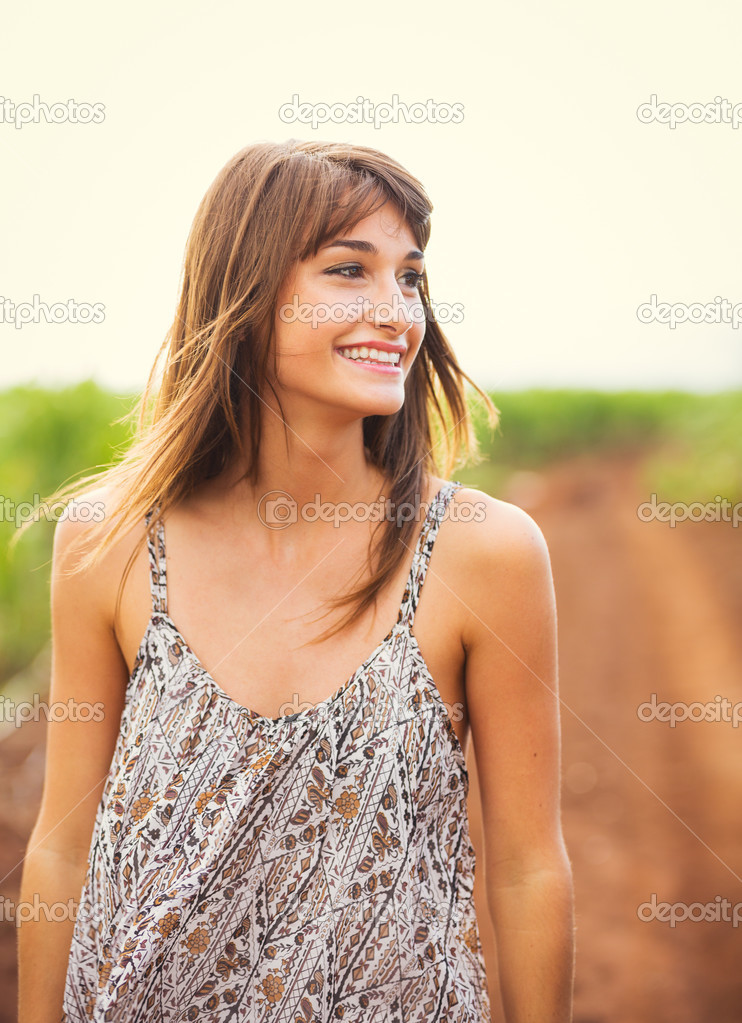 Girl walking in the field