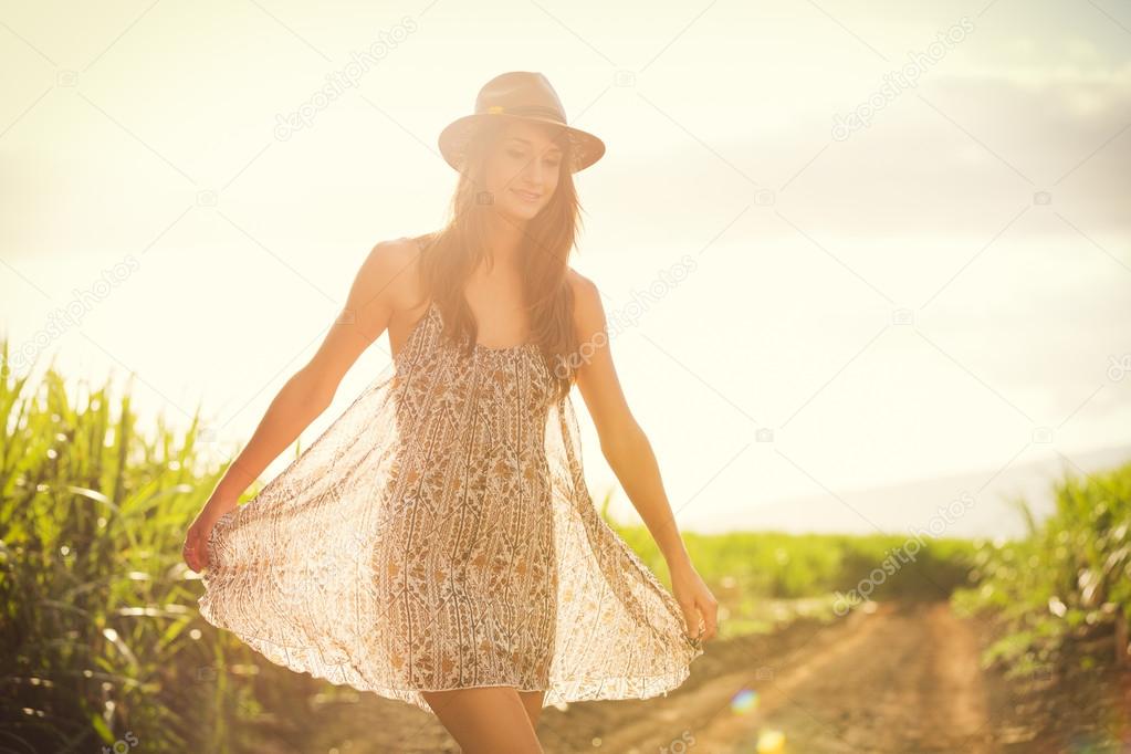 Girl walking in the field