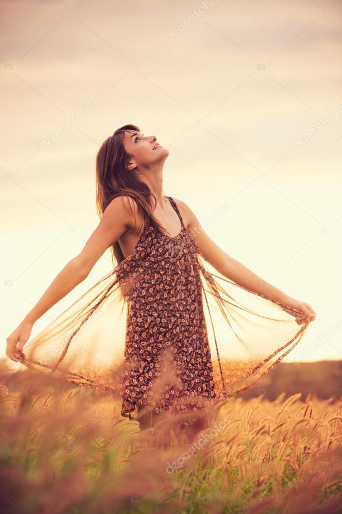 Happy woman in field
