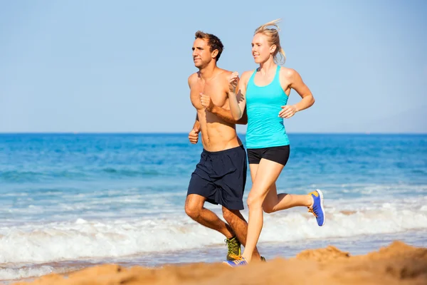 Sporty couple jogging together — Stock Photo, Image