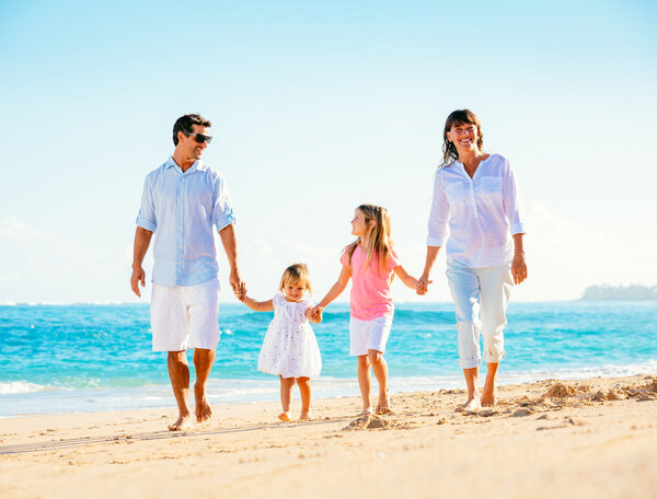 Family on tropical beach