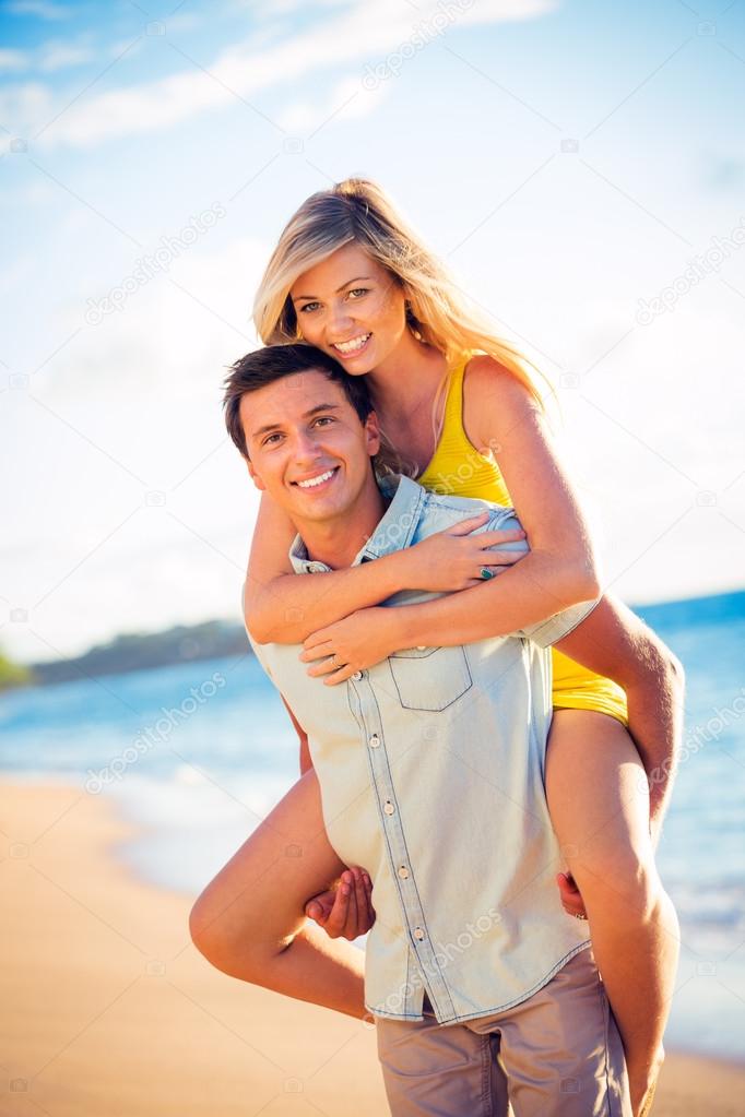 Couple on the beach at sunset