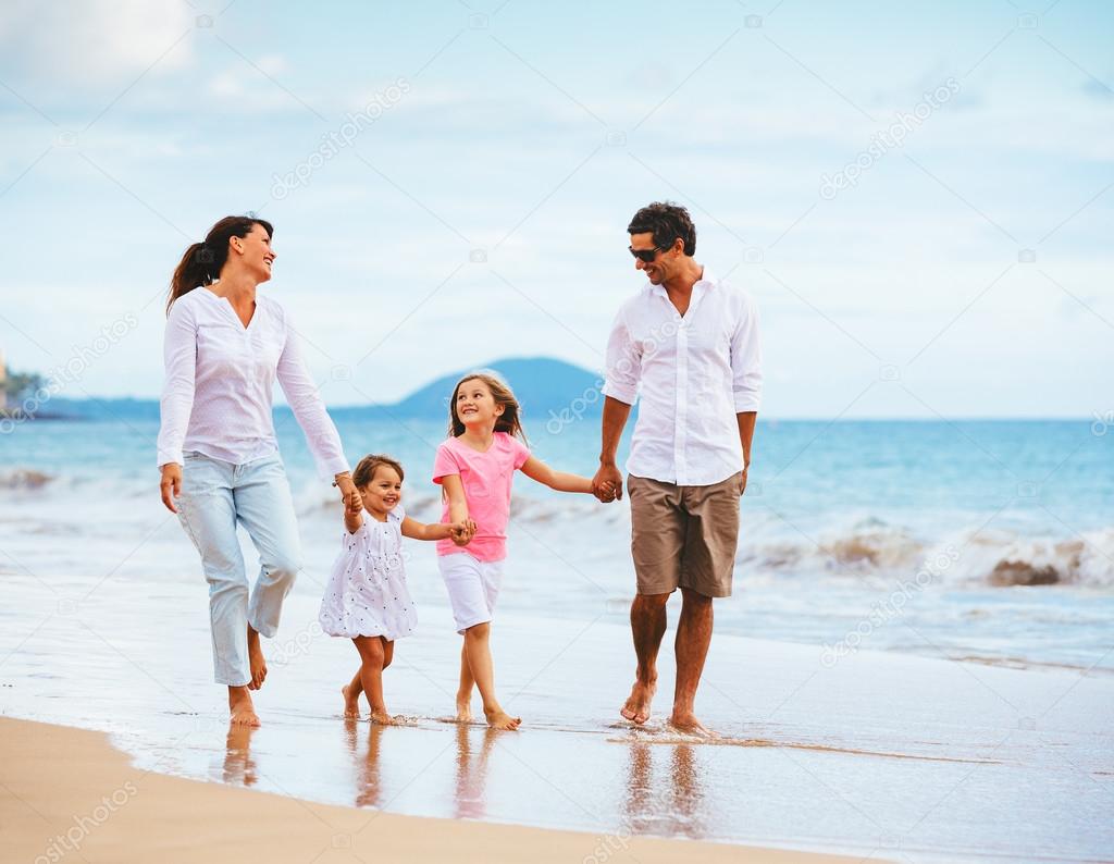 Family walking on the beach