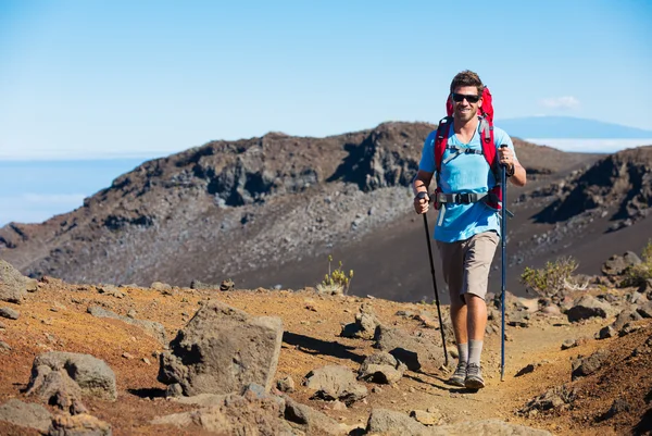 Hiker enjoying walk on amazing mountain trail — Stock Photo, Image