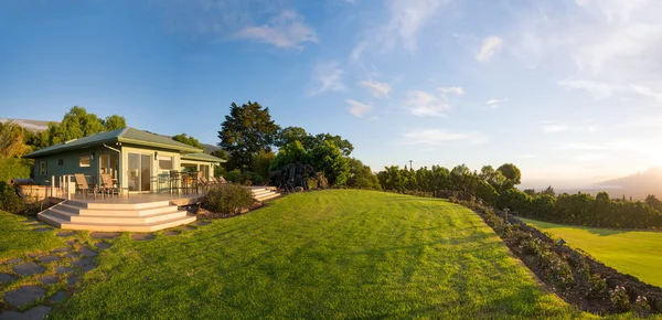 Home with grassy lawn — Stock Photo, Image