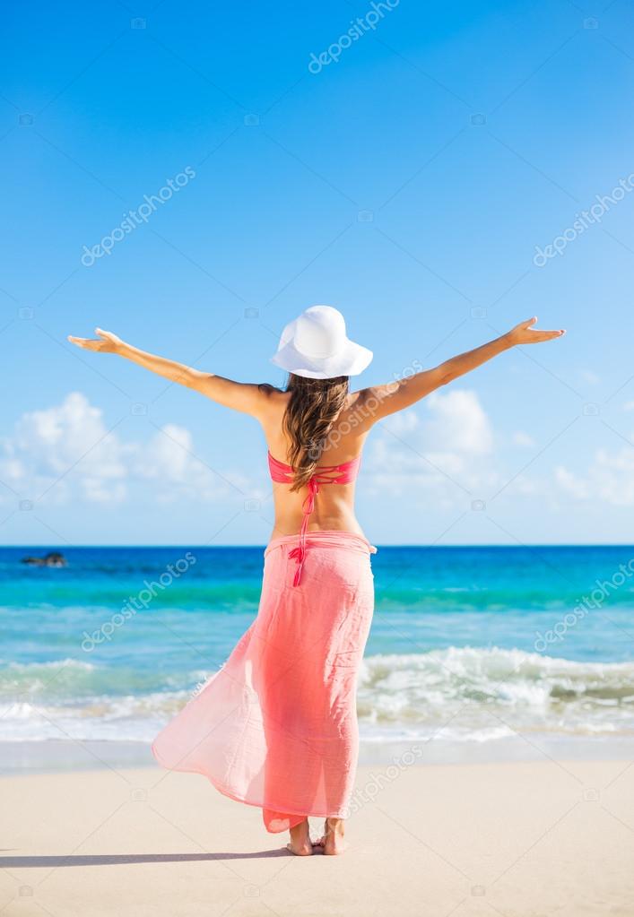 Happy woman at the beach Stock Photo by ©EpicStockMedia 51479553