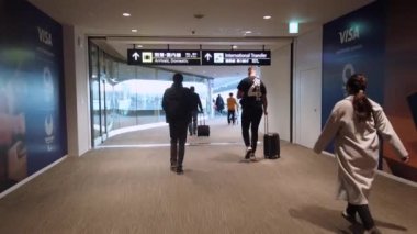 December28,2019: Toyko,Japan: Walking in hallway in Narita Airport Terminal while arriving Tokyo,Japan