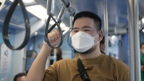 Asian Man Hands Holding Handrail Grip Straps Public Subway Transportation — ストック動画