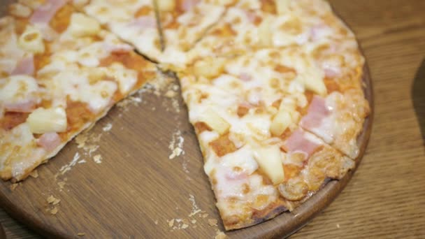 Taking Slice Pizza Close People Hands Taking Slices Pizza Wooden — Stockvideo