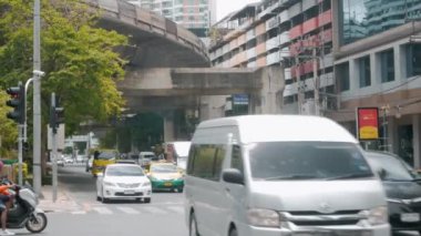 March 26,2022: Bangkok,Thailand: traffic at Silom Road intersection